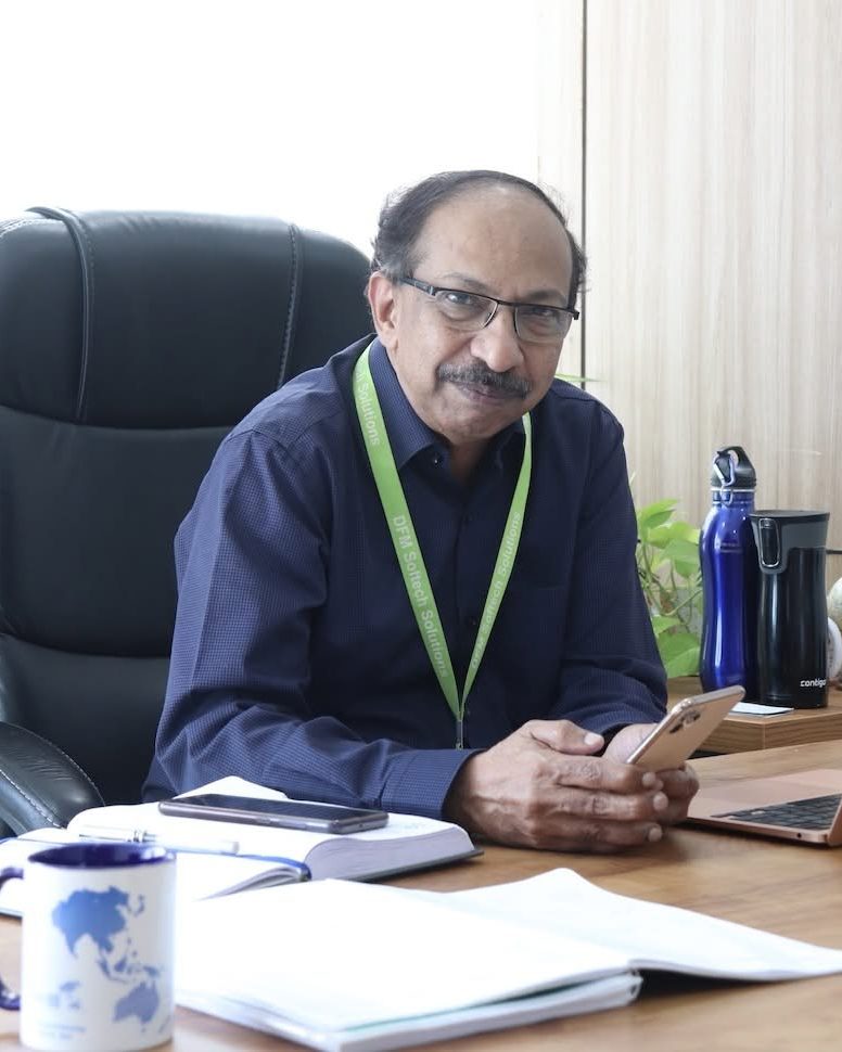 Dr. Suresh Nair at his office desk